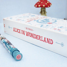 Load image into Gallery viewer, Angled view of the presentation box and pen. The side of the box has a print that reads: Retro 51 Alice in Wonderland