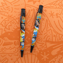 Load image into Gallery viewer, Two side views of the Smithereens blue, orange and yellow pen.
