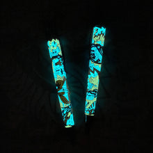 Load image into Gallery viewer, Side views of the pens glowing in the dark.