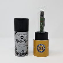 Load image into Gallery viewer, The pen arranged with its original packaging and small booklet on a white background.