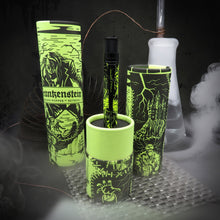 Load image into Gallery viewer, The Frankenstein pen arranged with the matching packaging on a dark background with lab instruments.