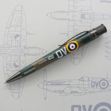Load image into Gallery viewer, Side view of the Retro 51 Imperial war Museum Spitfire N3200 Rollerball Pen. Set on a print with schematics of the plane.