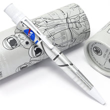 Load image into Gallery viewer, Angled view of the pen leaning on the gift tube. It has white trims.