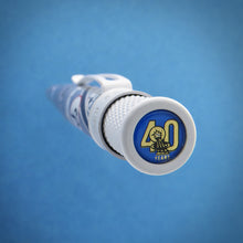 Load image into Gallery viewer, Close up to the top disk of the Mercury 7 Retro 51 Pen. It has the graphic of a shooting star and 40 Years