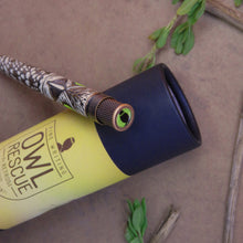 Load image into Gallery viewer, Close up to the top disk of The Retro 51 Owl Rescue Rollerball Pen. It has a small icon with a back owl on a lime green background.