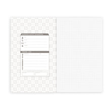 Load image into Gallery viewer, Inside view of the PanAM notebook. it has a section for contact information on the inside of the cover, and the paper is a dot grid.