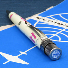 Load image into Gallery viewer, Angled top disk view of the pen. It features the blue and white Pan Am logo.