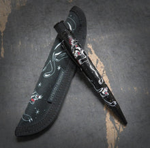 Load image into Gallery viewer, Side view of the pen leaning on the matching pen sleeve.