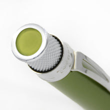 Load image into Gallery viewer, Close up to the top disk of the Juniper pen. It is a matching green color.
