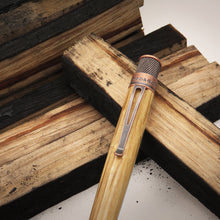 Load image into Gallery viewer, Close up to the clip of The Retro 51 Tornado Woodworks Bourbon barrel Pen.