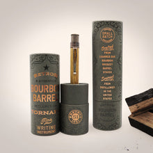 Load image into Gallery viewer, The Retro 51 Tornado Woodworks Bourbon barrel Pen with the gift tubes on a white background with some pieces of wood.