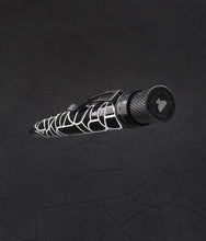 Load image into Gallery viewer, The pen showing the top disc showing an Hour Glass logo.