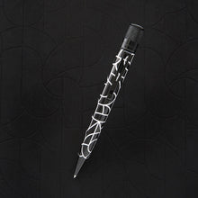 Load image into Gallery viewer, The pen with the black stealth clip facing forward, with matching black stealth accents, the body is acid etched, the background is dark, similar to the pen design.