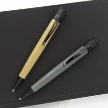 Load image into Gallery viewer, The Retro 51 Nardo Gray and Desert Sand Stealth Pens on a black and white background.