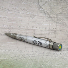 Load image into Gallery viewer, Angled view of the The Retro 51 Spirit of St. Louis Rollerball Pen. Placed on a printed map.