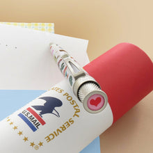 Load image into Gallery viewer, Angled top disk close up to the pen, featuring a red heart icon on a pink background.