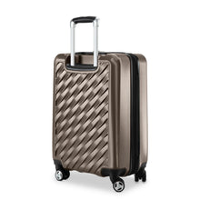 Load image into Gallery viewer, Angled back panel view of the bronze hard shell suitcase.