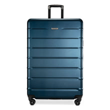 Load image into Gallery viewer, Front panel view of a navy blue suitcase with black accents.