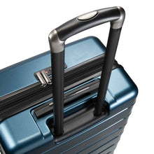 Load image into Gallery viewer, Angled top view of the navy blue suitcase with the telescopic handle extended.