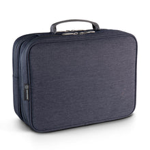 Load image into Gallery viewer, Angled back panel view of the closed toiletry bag