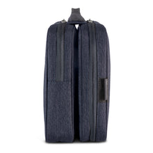 Load image into Gallery viewer, Side panel view of the closed toiletry bag.