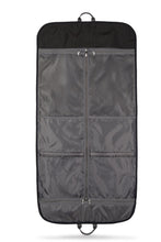 Load image into Gallery viewer, Interior view of the unfolded garment bag. featuring compartments.