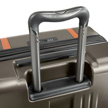 Load image into Gallery viewer, Angled top panel view oft he graphite suitcase with the telescopic handle extended.