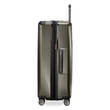 Load image into Gallery viewer, Side panel view of the graphite hard shell suitcase. It features a grab handle.