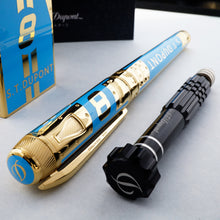 Load image into Gallery viewer, Angled view of the pen with the tool used to change the lighter flint.