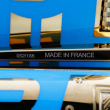 Load image into Gallery viewer, Close up to the pen's clip engraving on the side: it features the edition number, and MADE IN FRANCE. The edition number will vary.