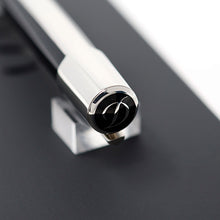 Load image into Gallery viewer, Close up to the top of the multiplication pen with a cursive letter D.