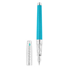 Load image into Gallery viewer, Front view of the ice blue fountain pen with the cap set to the side.