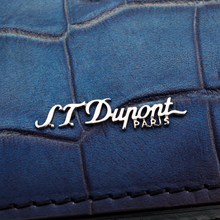 Load image into Gallery viewer, Close up to the S.T. Dupont logo on the front panel.