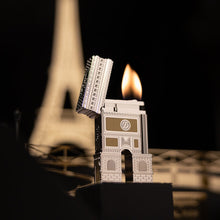 Load image into Gallery viewer, Angled front view of the lighter with the lid lifted. It is lit.