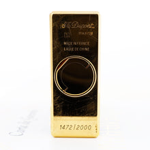 Load image into Gallery viewer, Bottom view of the lighter, featuring the engraved edition number, 1472 of 2000. It has visible brush marks.
