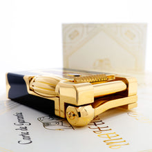 Load image into Gallery viewer, Angled top view of the lighter, laid atop the presentation box.