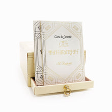 Load image into Gallery viewer, The lighter's booklets arranged within the drawer of the presentation box.