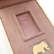 Load image into Gallery viewer, Close up to the interior box. A small blemish is in the lighter's holder.