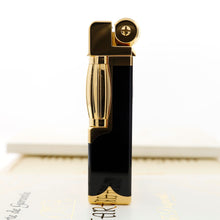 Load image into Gallery viewer, Side panel view of the lighter, showing the striker.