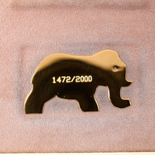 Load image into Gallery viewer, Close up to the Limited Edition lighter number engraved in the presentation box's elephant medal. It is 1472 of 2000. The medal has visible brush marks.
