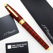 Load image into Gallery viewer, The capped fountain pen, displayed diagonally on a white surface alongside its black branded documentation and cards.
