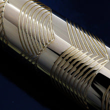 Load image into Gallery viewer, Close up to the golden portion of the barrel with engraved line work.