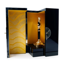 Load image into Gallery viewer, Front view of the fountain pen on its stand, placed in the presentation box.