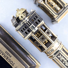 Load image into Gallery viewer, Close up to the side of the Opera House on the pen. Some patina is visible in sections of the bronze.