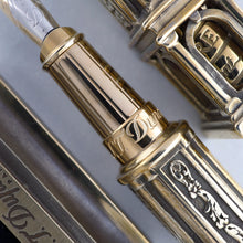 Load image into Gallery viewer, Close up to the pen's grip section with S.T. Dupont logo engraving.