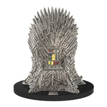 Load image into Gallery viewer, Front view of the lighter set on its iron throne-shaped stand.