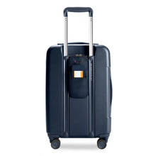Load image into Gallery viewer, Briggs & Riley Sympatico Essentia Carry-On Spinner Navy
Power Pocket™ on the back of the bag allows for a pass-through USB cord for easy, on-the-go charging. Shown with Retractable ID tag on power pocket.
Dimensions: 22 x 14 x 9-11.25 in / 55.9 x 35.6 x 22.9-28.6 cm