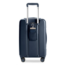 Load image into Gallery viewer, Briggs & Riley Sympatico Essential Carry-On Spinner - Navy
Power Pocket™ on the back of the bag allows for a pass-through USB cord for easy, on-the-go charging.
Dimensions: 22 x 14 x 9-11.25 in / 55.9 x 35.6 x 22.9-28.6 cm
