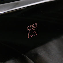 Load image into Gallery viewer, Close up to the artist signature on the lid's front face.