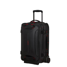 Load image into Gallery viewer, Angled front panel view of the suitcase with the telescopic handle partially extended .